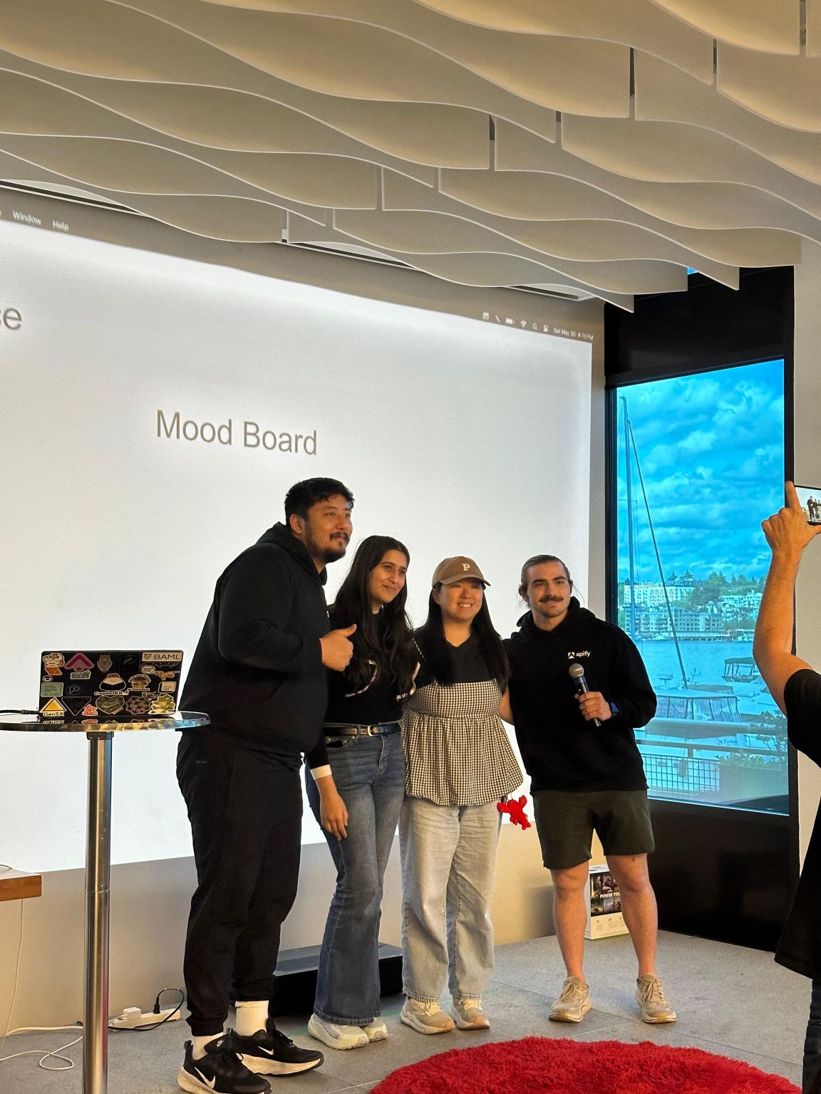 The four-person team on stage after winning 1st place in the Apify Prize